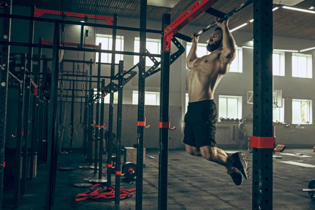 pull-ups on the bar in the gym